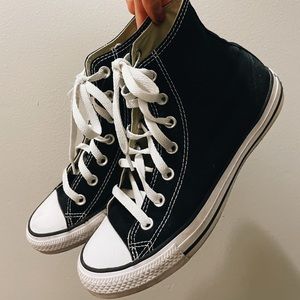 Black Canvas converse high tops.